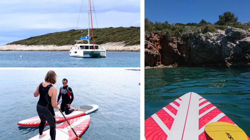 Sunsail catamaran, paddleboarders, Croatia's coast